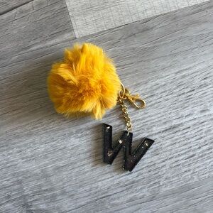 Initial W, keychain or backpack charm with pom-pom, black and gold